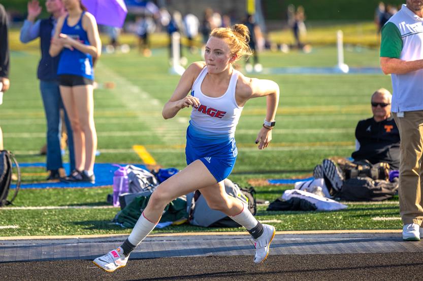 Students run in track and field